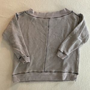 Anthropologie Pilcro off the shoulder slouchy sweatshirt in a lavender purple.